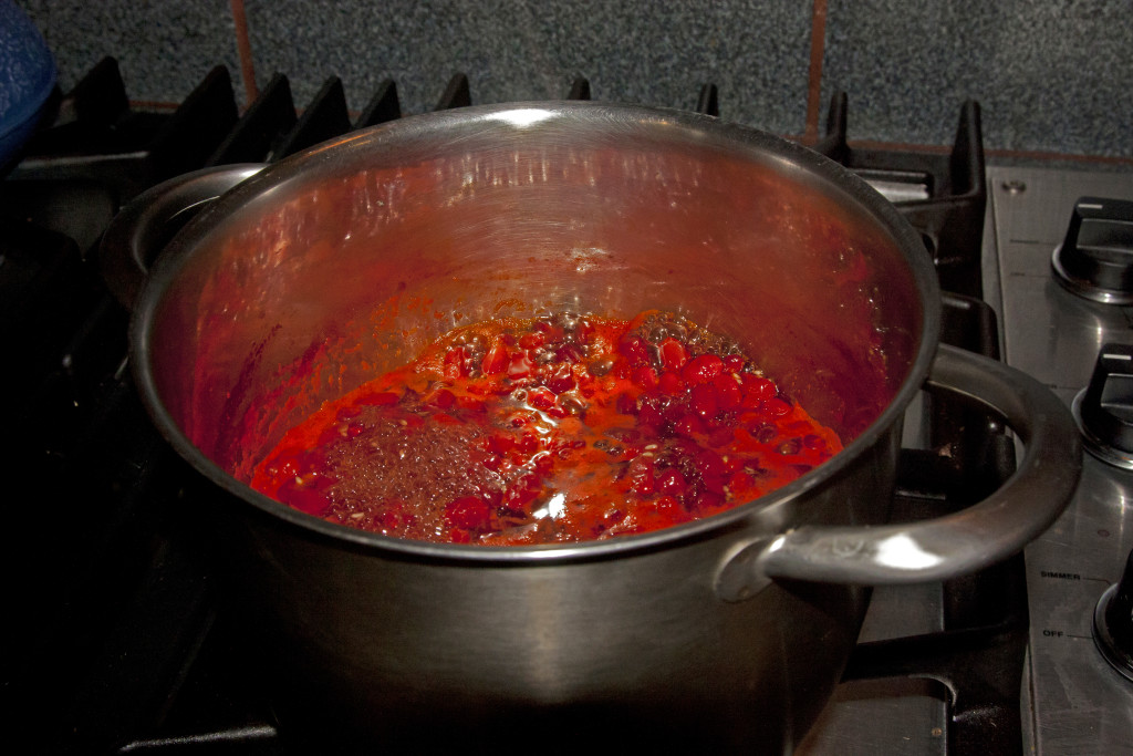 watermelon berry jam cooking on the stove