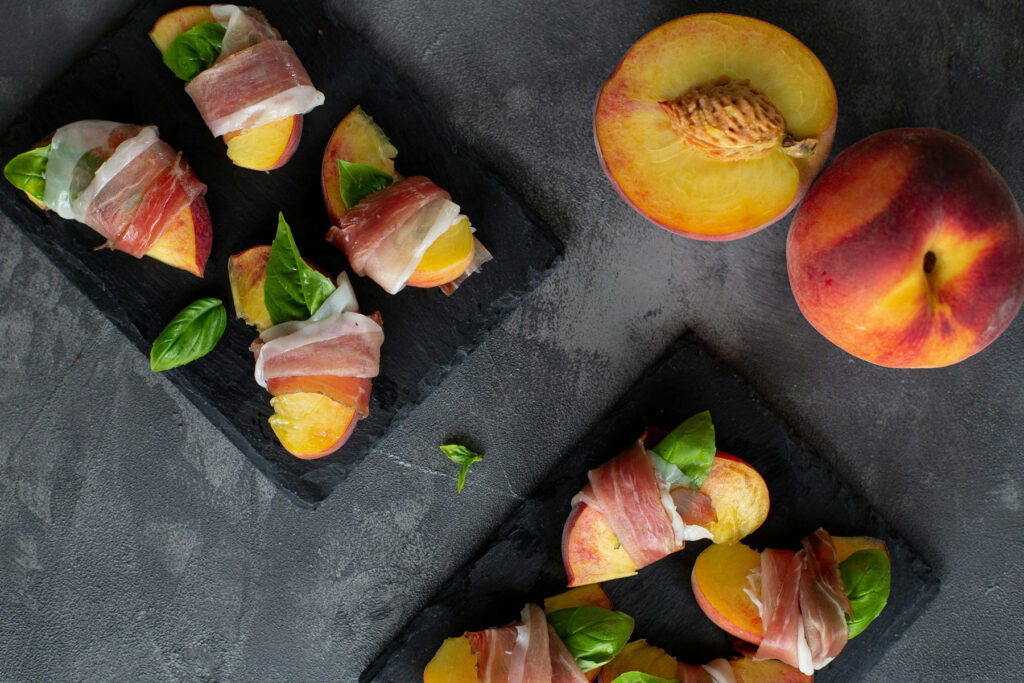 Image of nectarines and basil wrapped in prosciutto appetizers